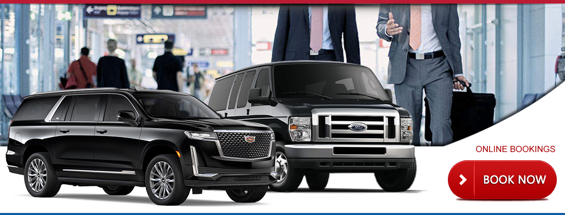 Cadillac Escalade SUV and Ford passenger van waiting at the airport terminal